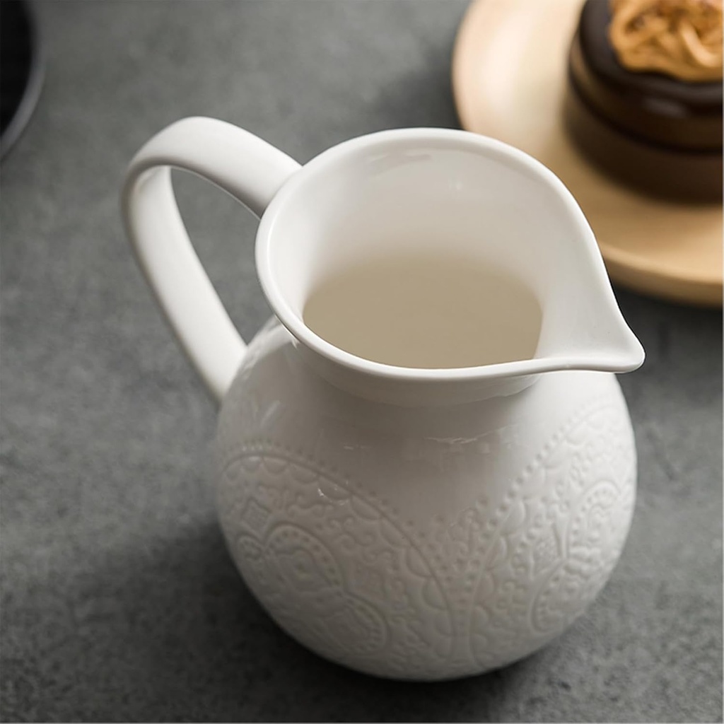 porcelain-milk-creamer-pitcher-with-hand-4.jpg